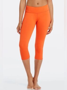 EUC Fabletics Define Power orange mid-rise crop pants